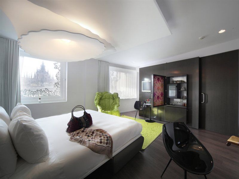 Hotel Palazzo Matteotti, The Dedica Anthology, Autograph Collection Milán Exteriér fotografie A bedroom at the hotel