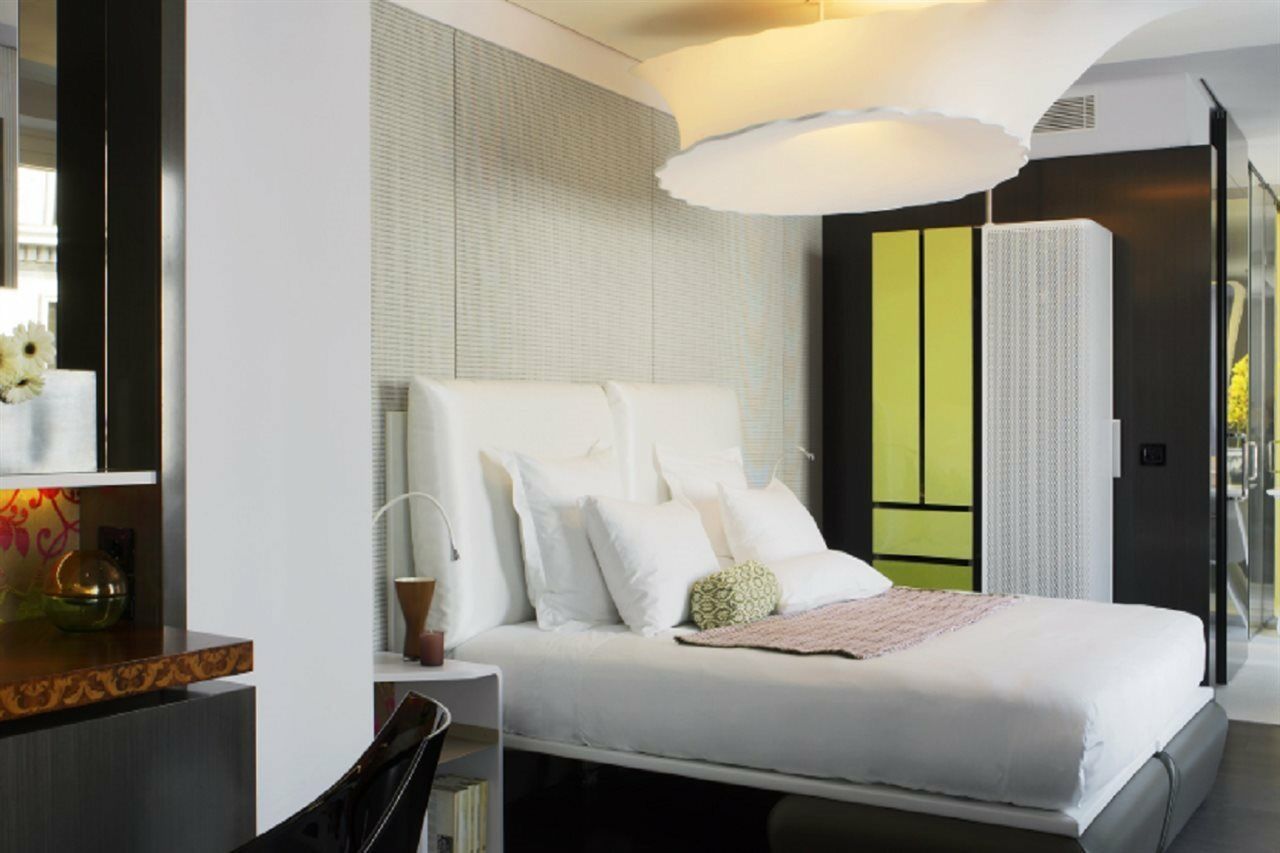 Hotel Palazzo Matteotti, The Dedica Anthology, Autograph Collection Milán Exteriér fotografie A bedroom at the hotel